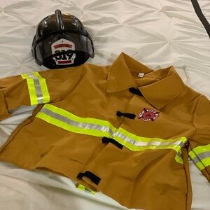 Kids firefighter costume. Size 7-8. Front Velcro straps.